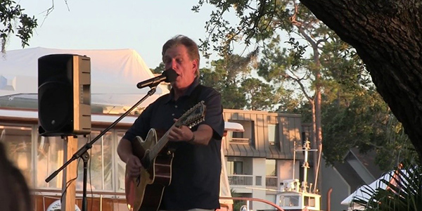 Gregg Russell performing in Sea Pines under the Liberty Oak
